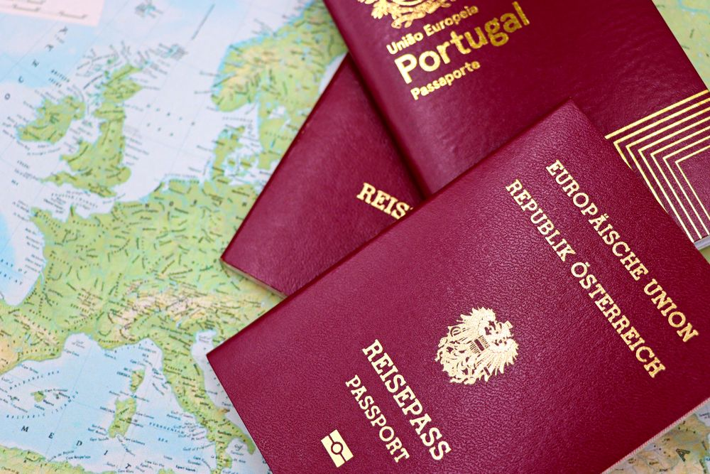 European passports laid out with a travel map