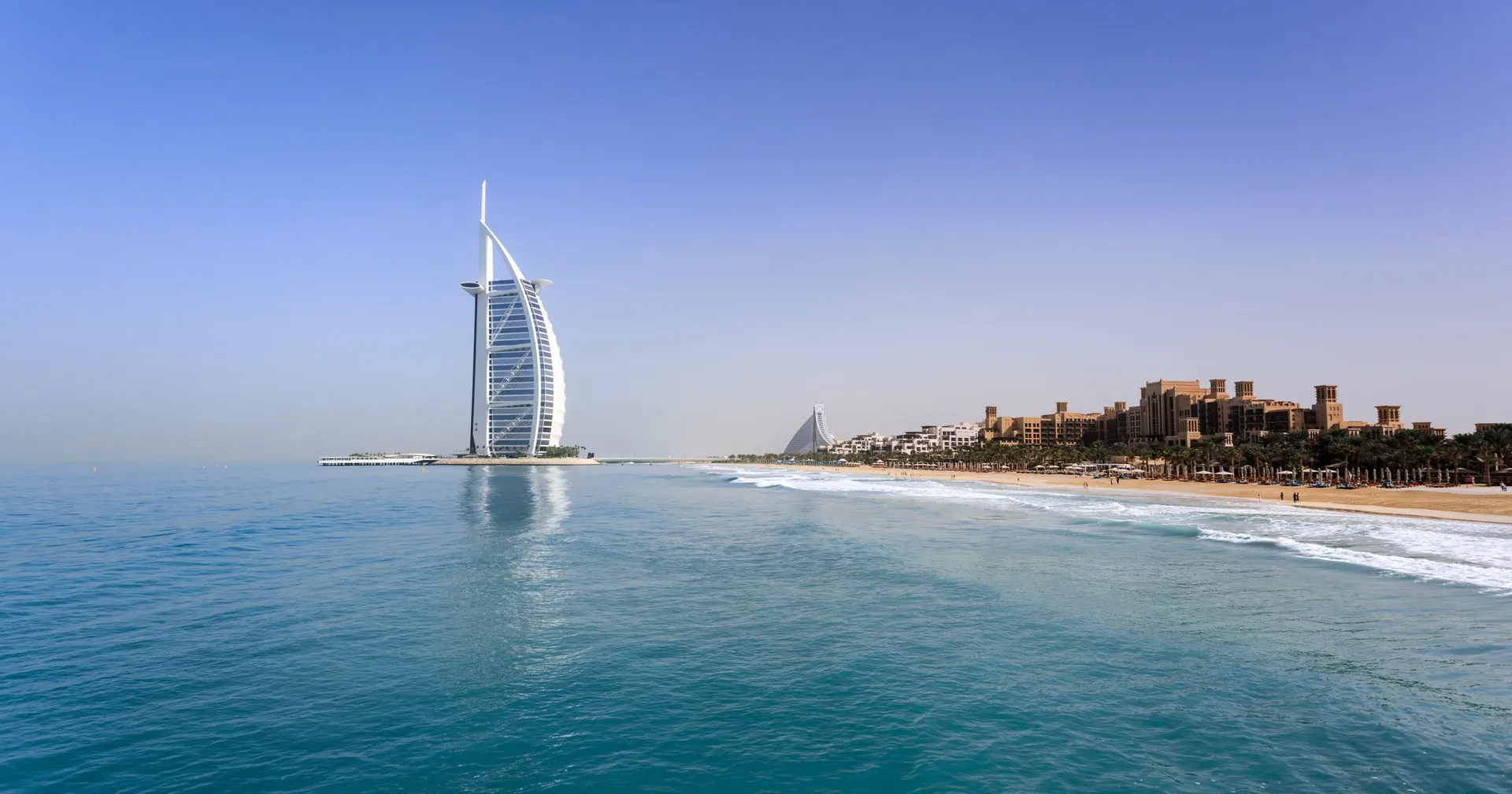 Burj Al Arab sail-shaped hotel on its island off Jumeirah Beach, Dubai