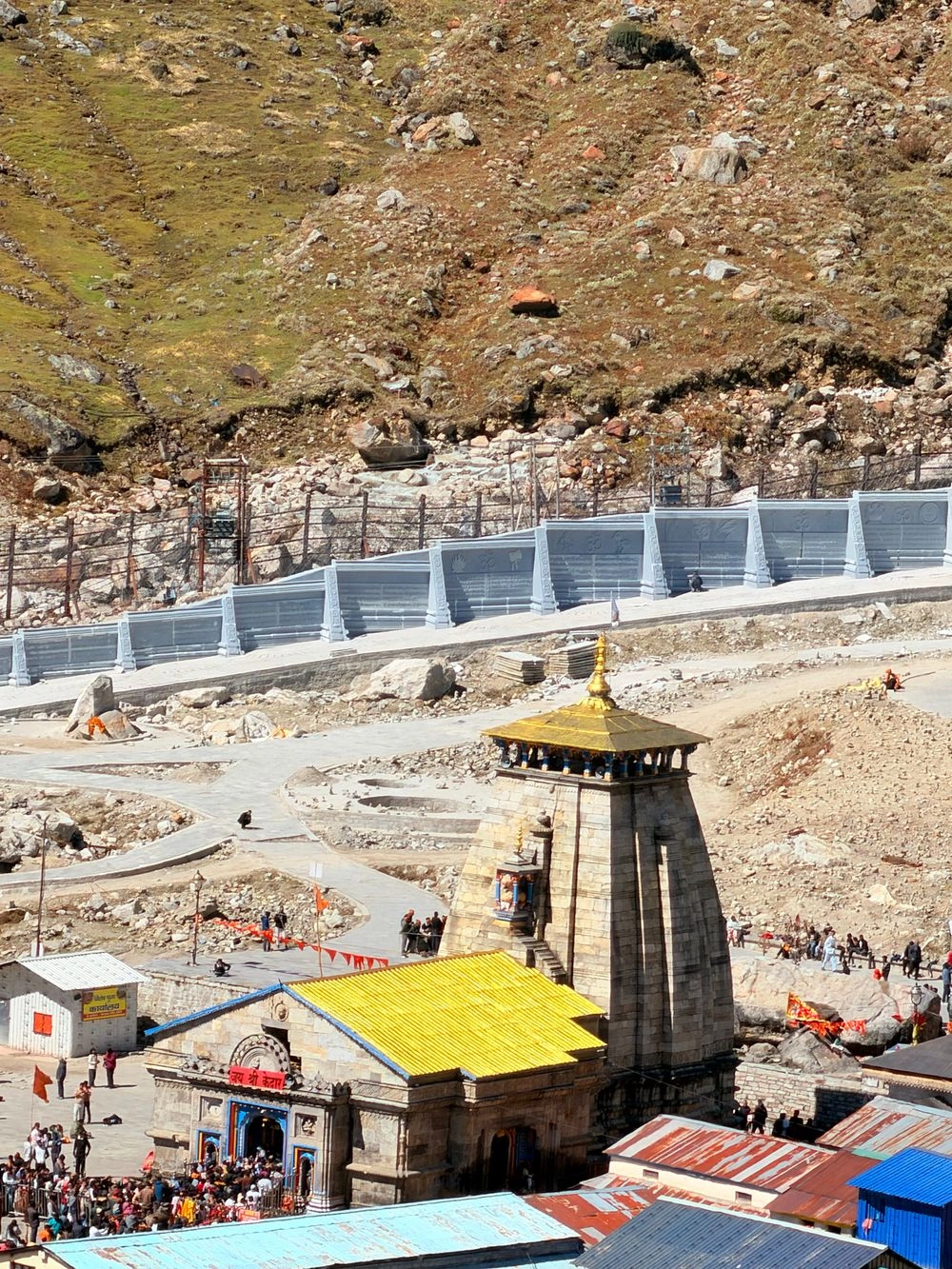 Aerial view of Kedarnath Temple surrounded by mountains