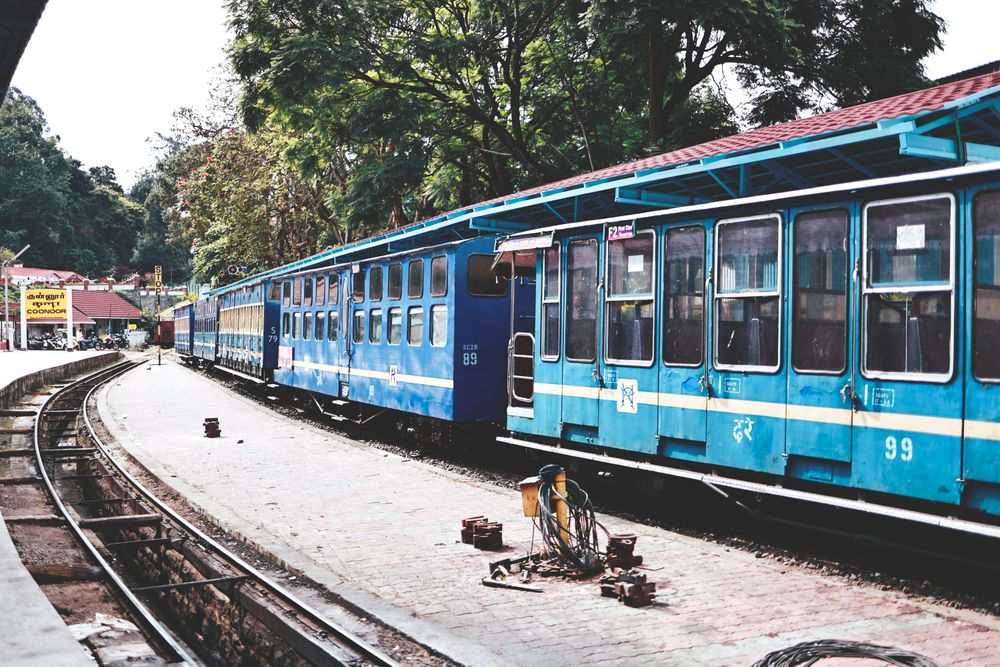 A scenic passenger train at a South India railway station